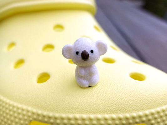 Colorful koala charms on a yellow shoes shoe. These cute koala bear charms have an Australian vibe that make it the perfect gift for any ozzy.