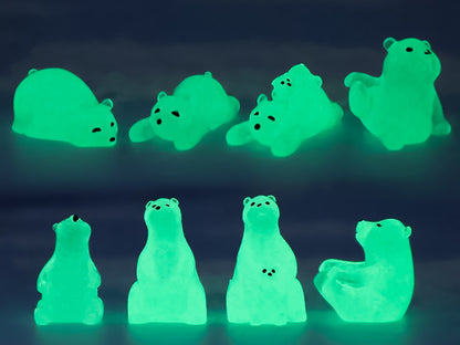 Tan shoes adorned with glow-in-the-dark polar bear charms and clear ice cube charms, set on a tree branch for an outdoor, nature-inspired photo. The polar bears are placed playfully around the shoe, adding a fun, wintry theme.