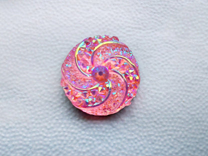 Colorful crystal round charms with sparkly rhinestones on a brown shoe shoe. These vibrant and glittering accessories add a dazzling touch to your footwear, perfect for customizing your shoes with a unique and eye-catching sparkle.