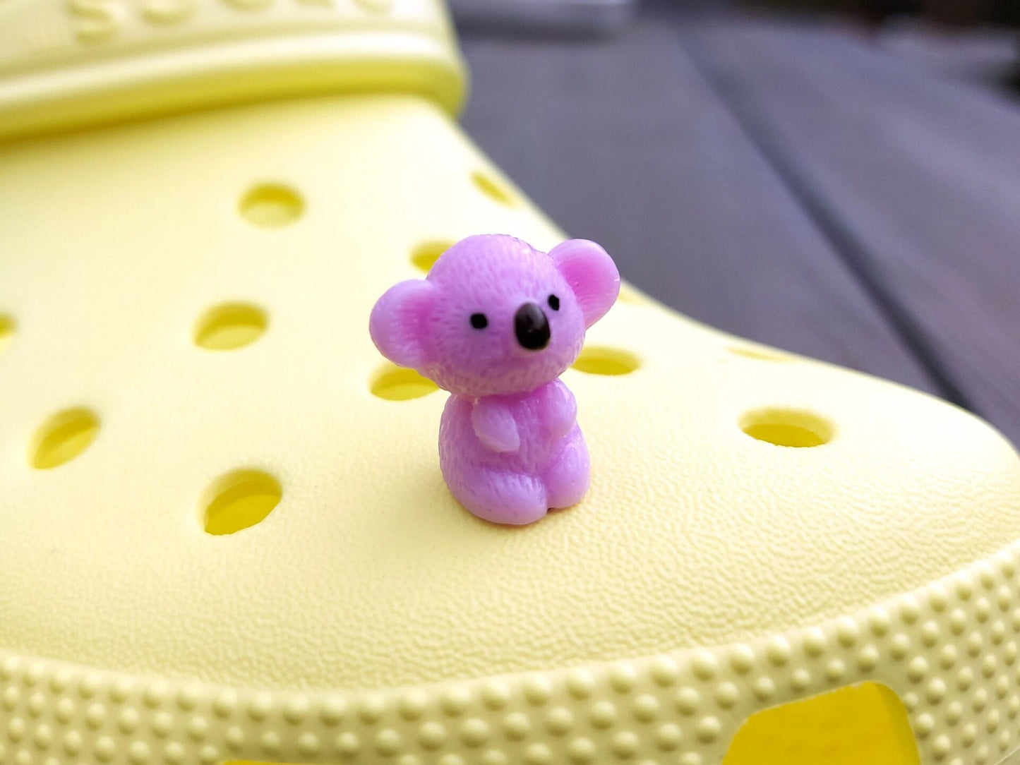 Colorful koala charms on a yellow shoes shoe. These cute koala bear charms have an Australian vibe that make it the perfect gift for any ozzy.