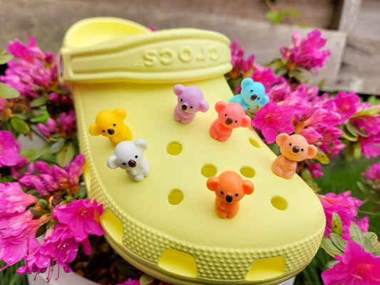 Colorful koala charms on a yellow shoes shoe. These cute koala bear charms have an Australian vibe that make it the perfect gift for any ozzy.