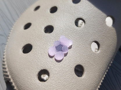 Close-up of sugar gummy bear charms on a shoe shoe, featuring bright, colorful gummy bear designs. The charms are securely attached, adding a playful, candy-inspired touch to the shoe with a fun and vibrant look.
