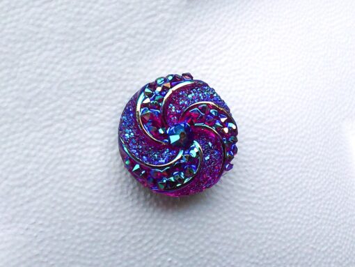 Colorful crystal round charms with sparkly rhinestones on a brown Croc shoe. These vibrant and glittering accessories add a dazzling touch to your footwear, perfect for customizing your Crocs with a unique and eye-catching sparkle.